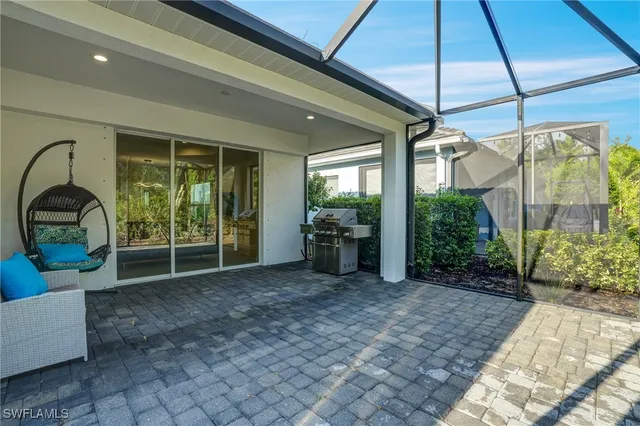 a view of a room with furniture and a yard