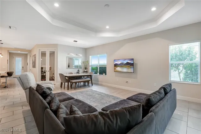 a living room with furniture and a table