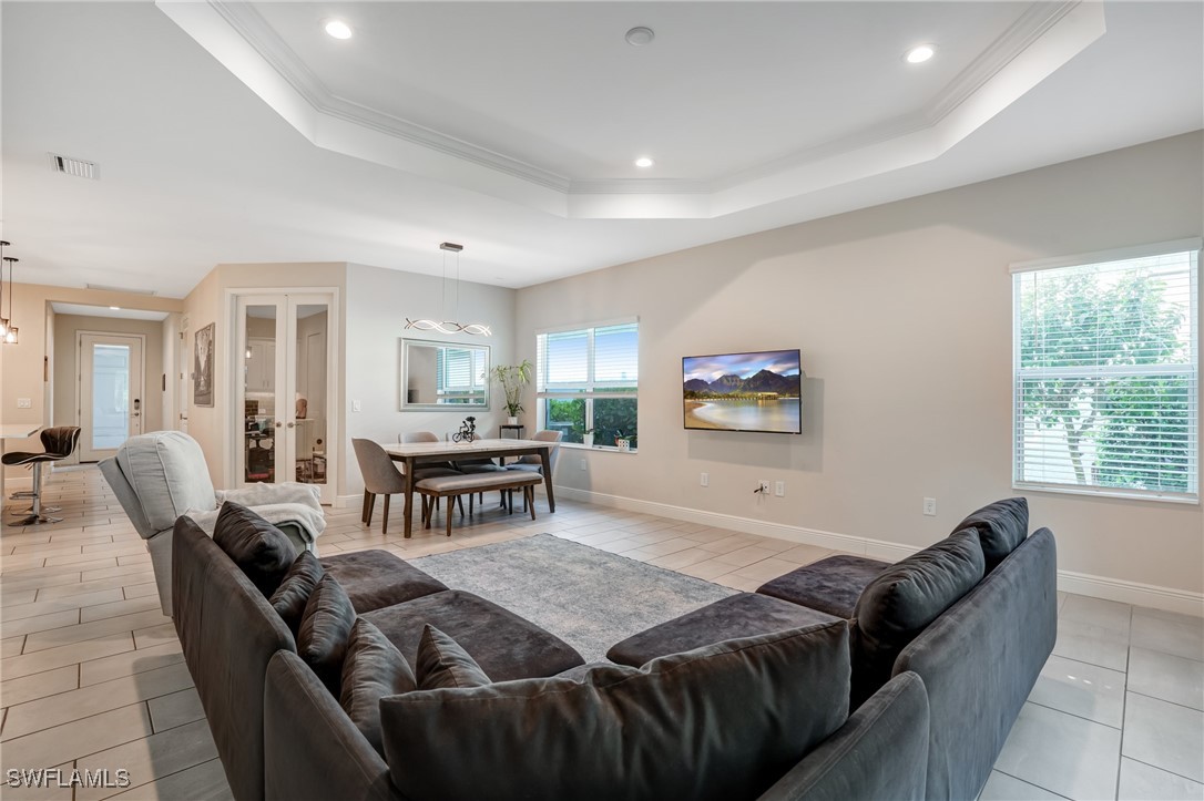 7028 Mistral Way Fort Myers, FL 33966 - Photo 5 of 37 a living room with furniture and a table