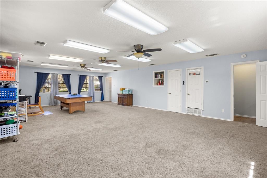 1701 Hitching Post Road Granbury, TX 76049 - Photo 12 of 37 Large flex room upstairs