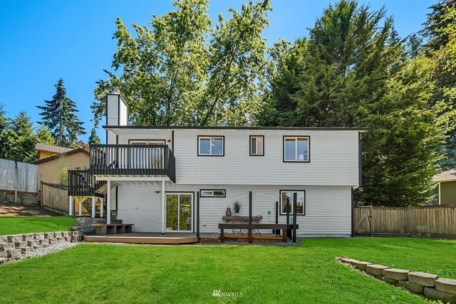a house view with a garden space