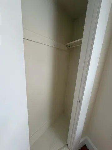 a kitchen with a sink a stove and a refrigerator