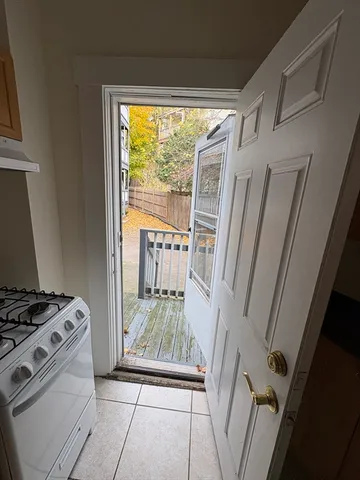 a view of balcony with wooden floor