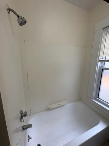 a bathroom with a bathtub