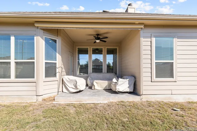 a living room with furniture and window