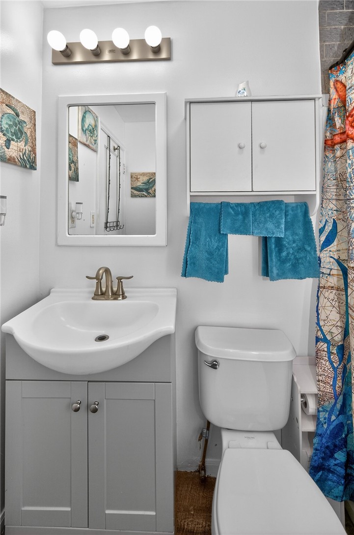 3301 Wildwood Road Middletown, OH 45042 - Photo 22 of 68 This bathroom features practical storage and a clean design, perfect for daily routines.