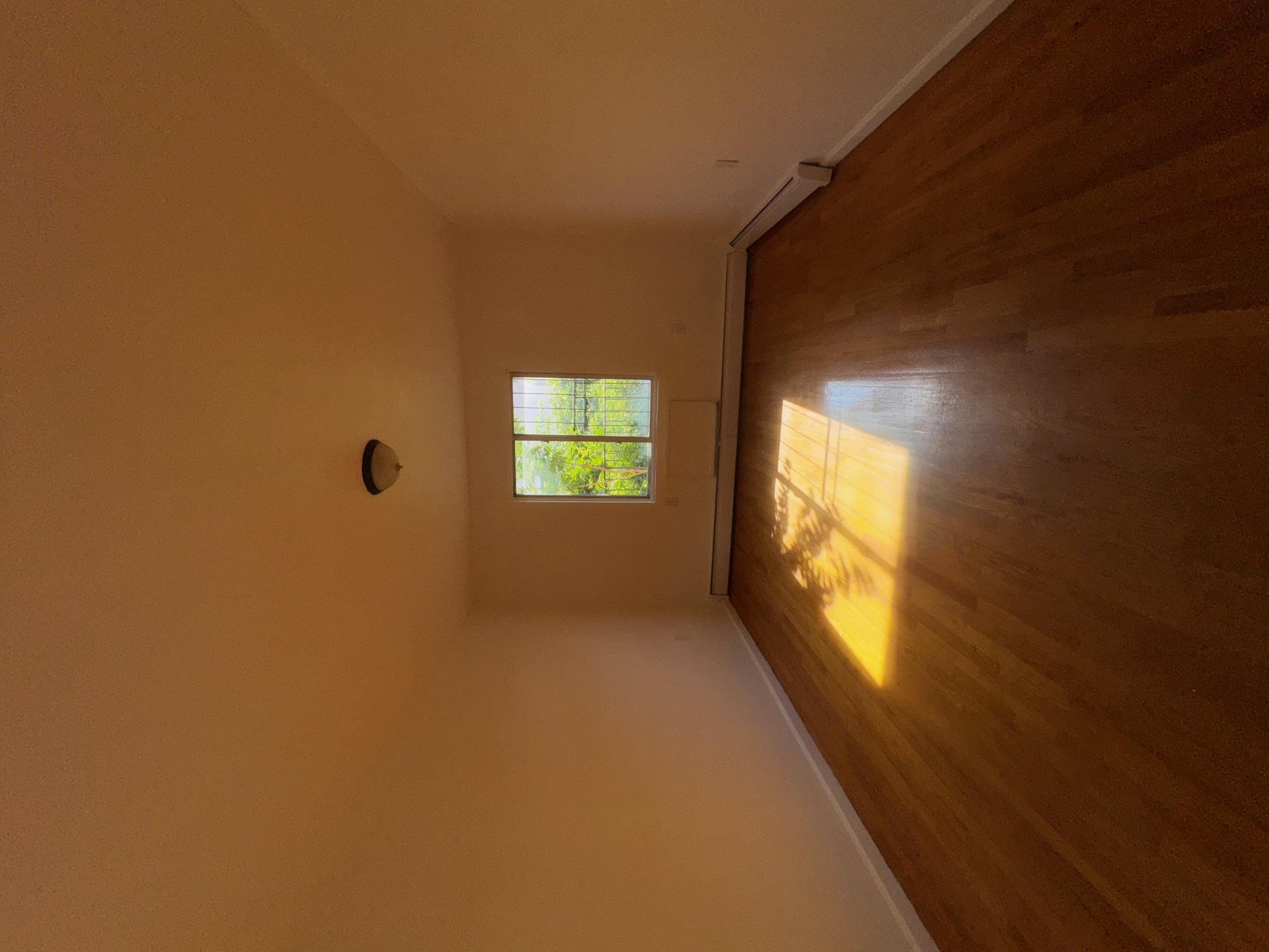 631 Coster Street Bronx, NY 10474 - Photo 13 of 19 an empty room with a window