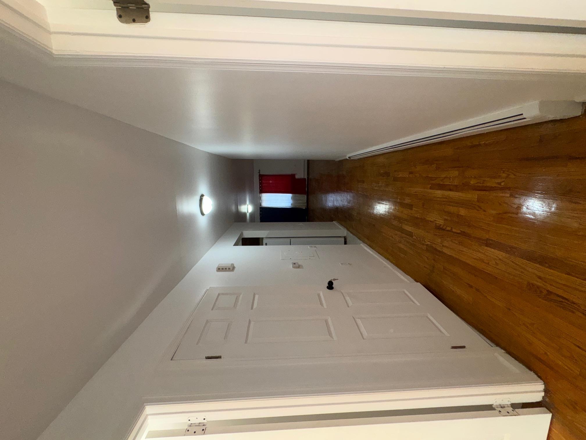 631 Coster Street Bronx, NY 10474 - Photo 17 of 19 a view of gallery with wooden floor