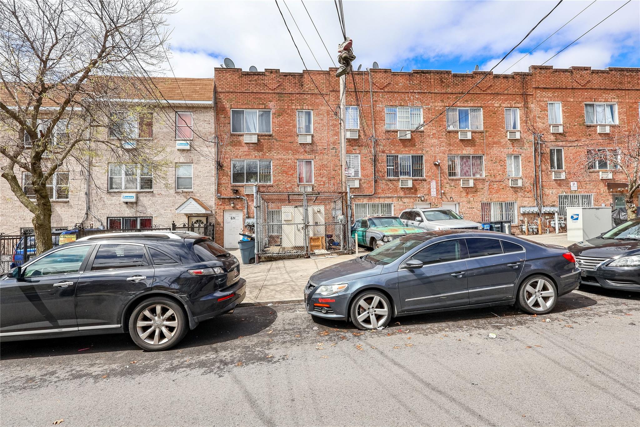 631 Coster Street Bronx, NY 10474 - Photo 5 of 19 a view of a car parked in front of a building