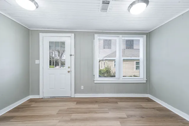 an empty room with windows