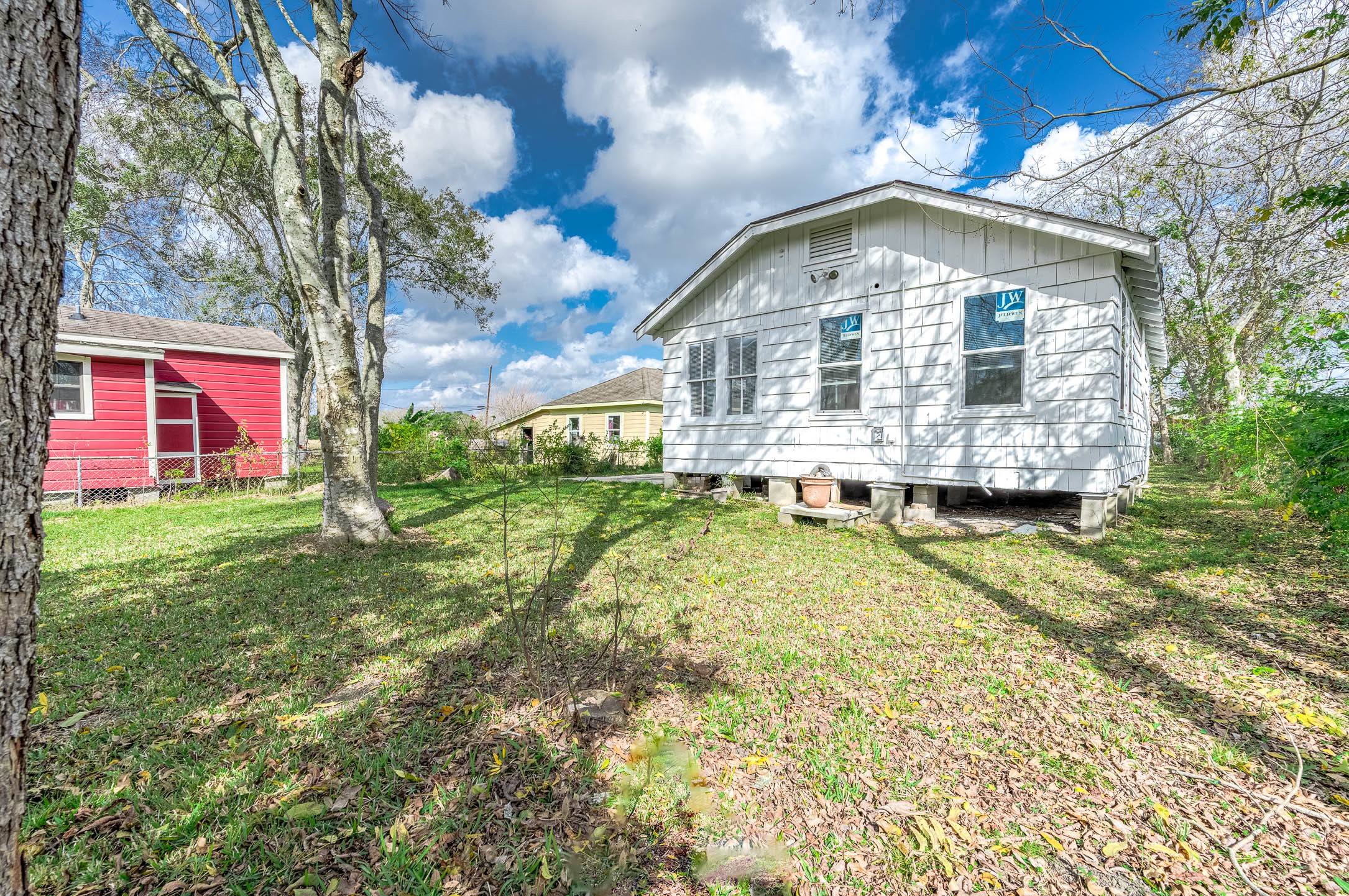 2012 Avenue F Dickinson, TX 77539 - Photo 20 of 20 a front view of a house with garden