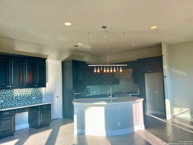 a view of counter top space and staircase
