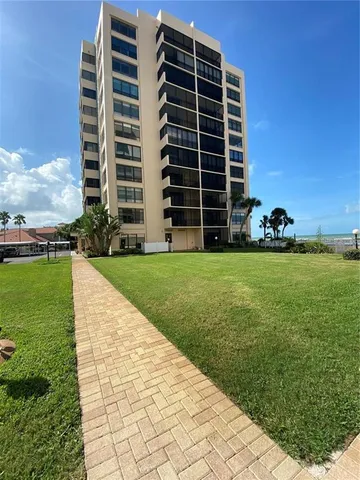 a view of a building with garden