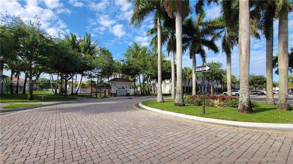 8297 Southwest 25th Court, Unit 101 Miramar, FL 33025 - Photo 35 of 42 a view of a park with palm trees