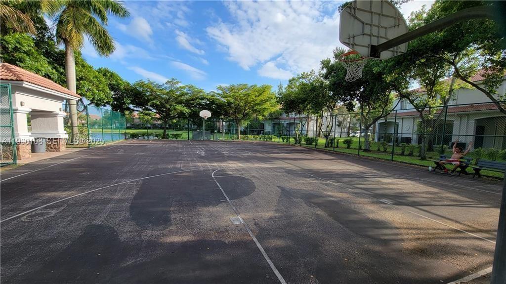8297 Southwest 25th Court, Unit 101 Miramar, FL 33025 - Photo 41 of 42 a backyard of a house with lots of green space