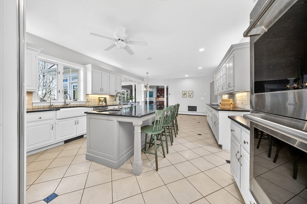 792 A Jerusalem Road Cohasset, MA 02025 - Photo 14 of 42 a kitchen with a sink a counter top space appliances and cabinets