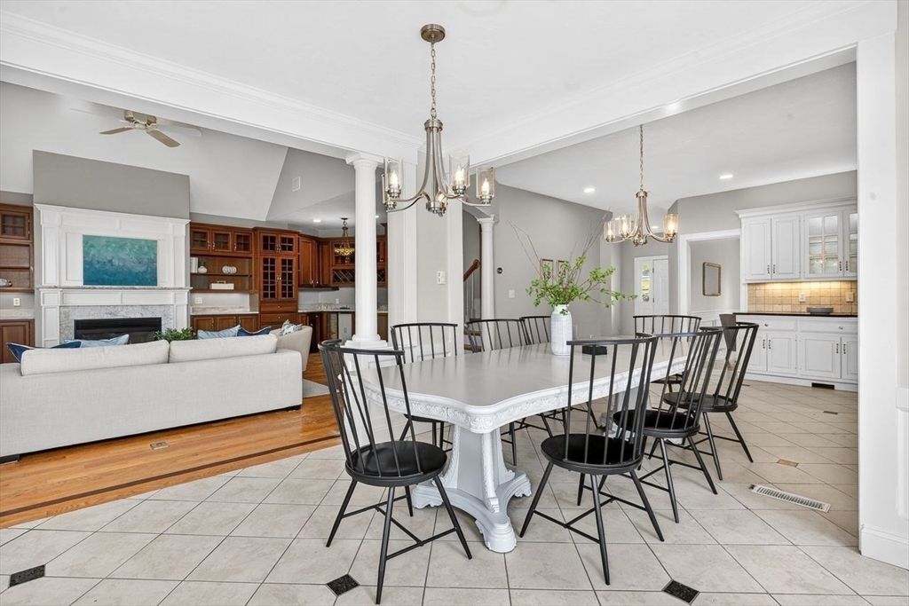 792 A Jerusalem Road Cohasset, MA 02025 - Photo 15 of 42 a view of a dining room with furniture and a chandelier