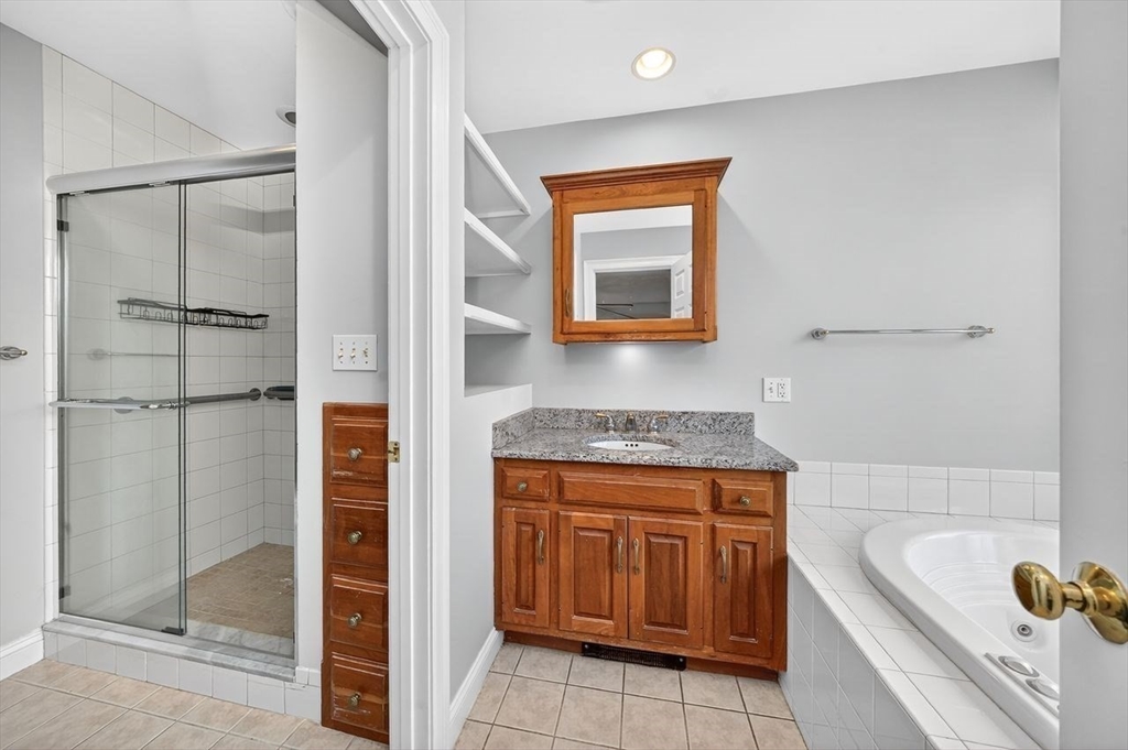 792 A Jerusalem Road Cohasset, MA 02025 - Photo 26 of 42 a bathroom with a tub and shower