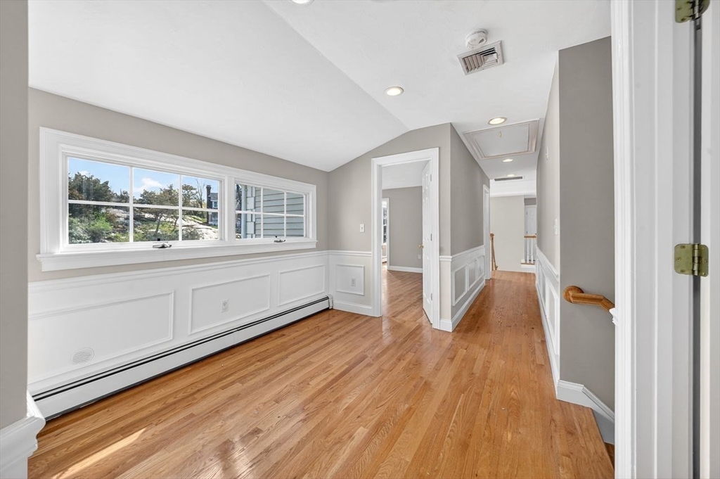 792 A Jerusalem Road Cohasset, MA 02025 - Photo 29 of 42 a view of an empty room with wooden floor and a window