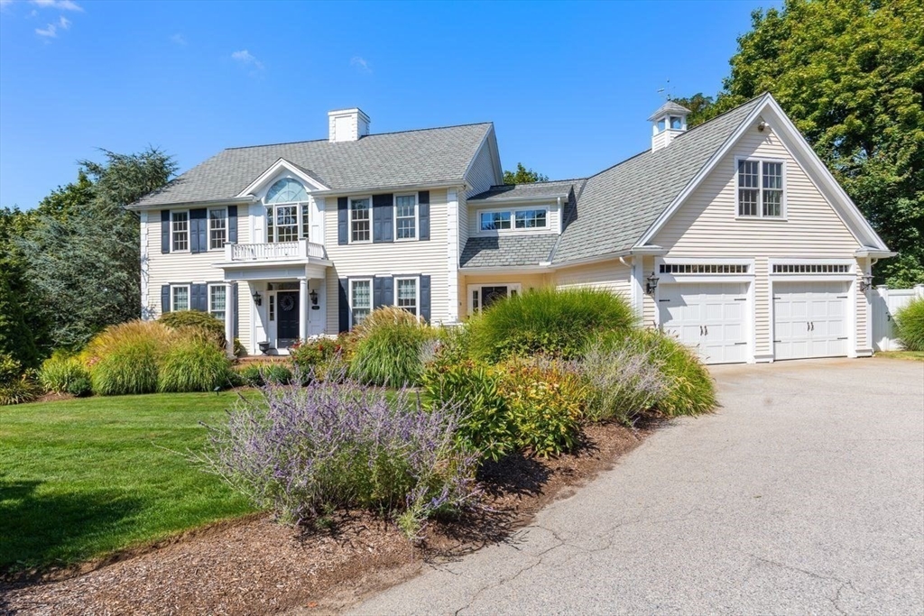 792 A Jerusalem Road Cohasset, MA 02025 - Photo 3 of 42 a front view of a house with a garden