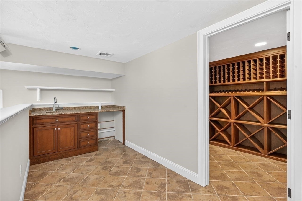 792 A Jerusalem Road Cohasset, MA 02025 - Photo 35 of 42 a room with a dresser and a sink