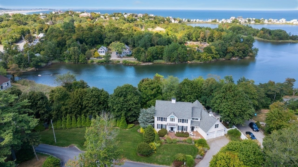 792 A Jerusalem Road Cohasset, MA 02025 - Photo 38 of 42 an aerial view of a house with a yard lake view and mountain view