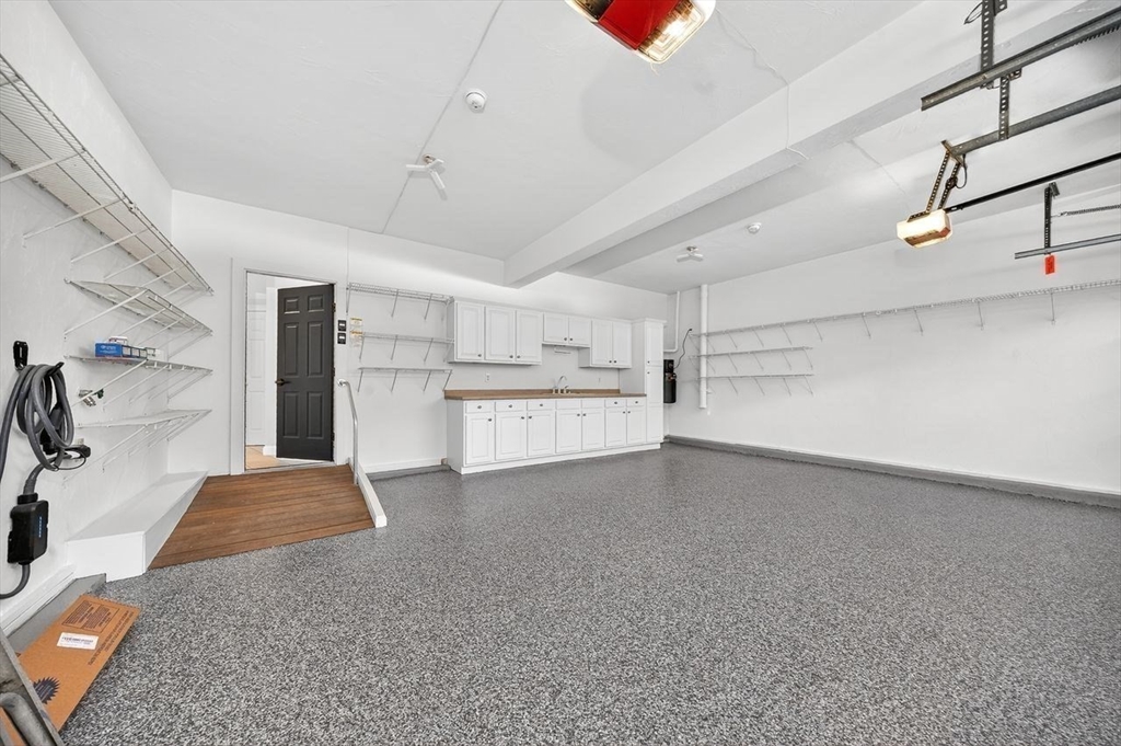 792 A Jerusalem Road Cohasset, MA 02025 - Photo 39 of 42 a view of a kitchen with a sink and cabinets