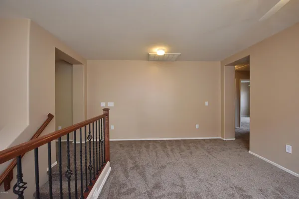 a view of a hallway with entryway