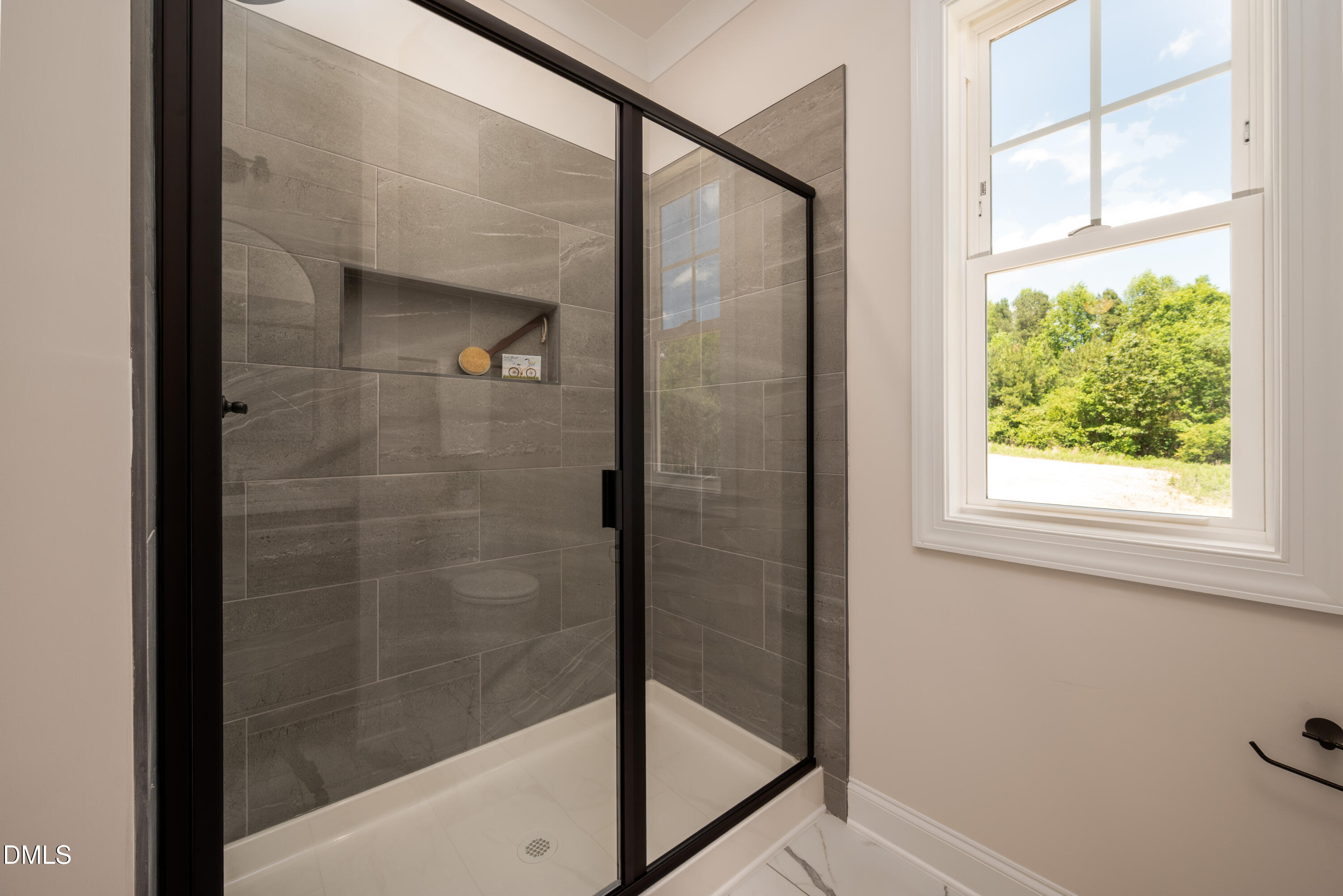 2275 Peachtree Hills Road Spring Hope, NC 27882 - Photo 24 of 43 a bathroom with a glass shower door