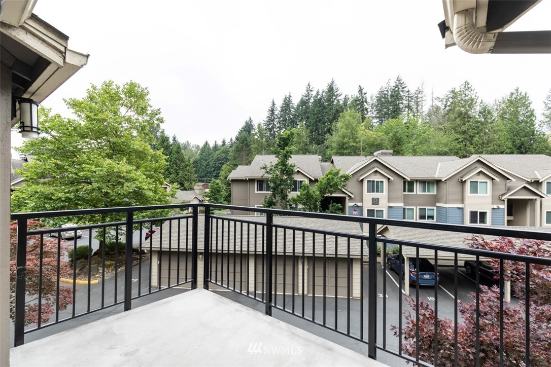 19410 Bothell Way Northeast, Unit D301 Bothell, WA 98011 - Photo 16 of 18 a view of a street from a balcony