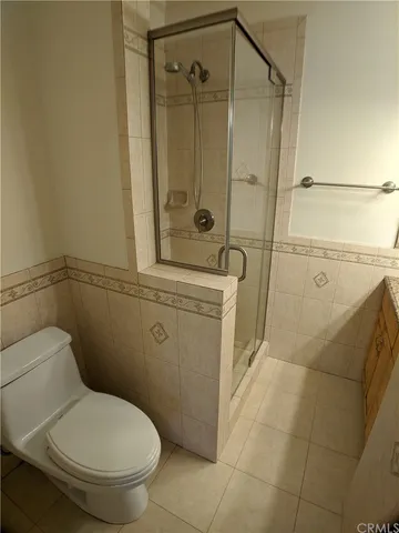 a bathroom with a toilet and a sink