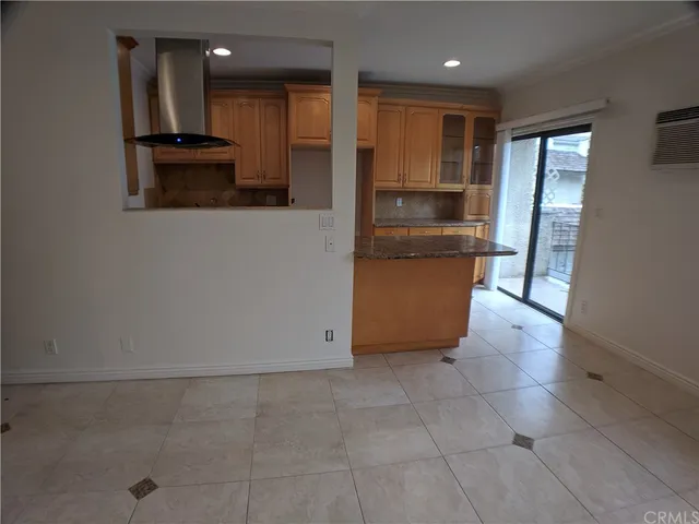 a kitchen with stainless steel appliances granite countertop a sink and cabinets