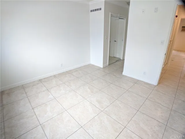 a bathroom with a glass door shower