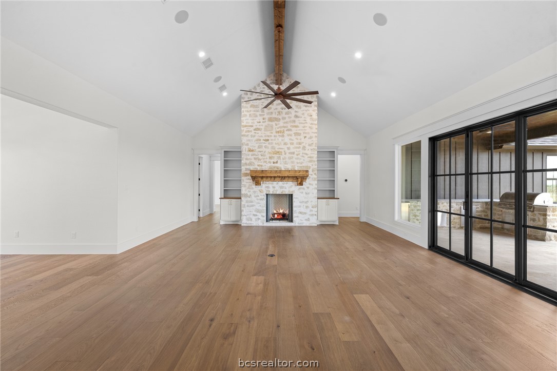 424 Pleasant Hill School Road Brenham, TX 77833 - Photo 4 of 26 Floor to ceiling custom stonework brings the "old world" feel that speaks volumes on the outside into the interior space.