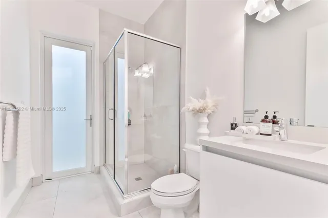 a bathroom with a sink and a washing machine