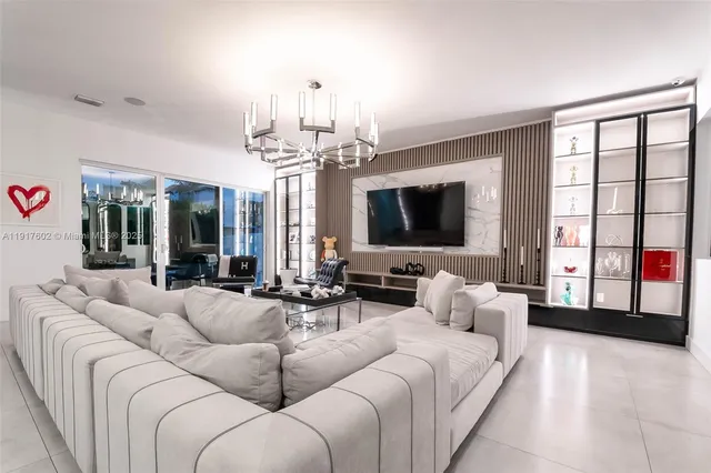 a kitchen with stainless steel appliances a refrigerator sink and cabinets