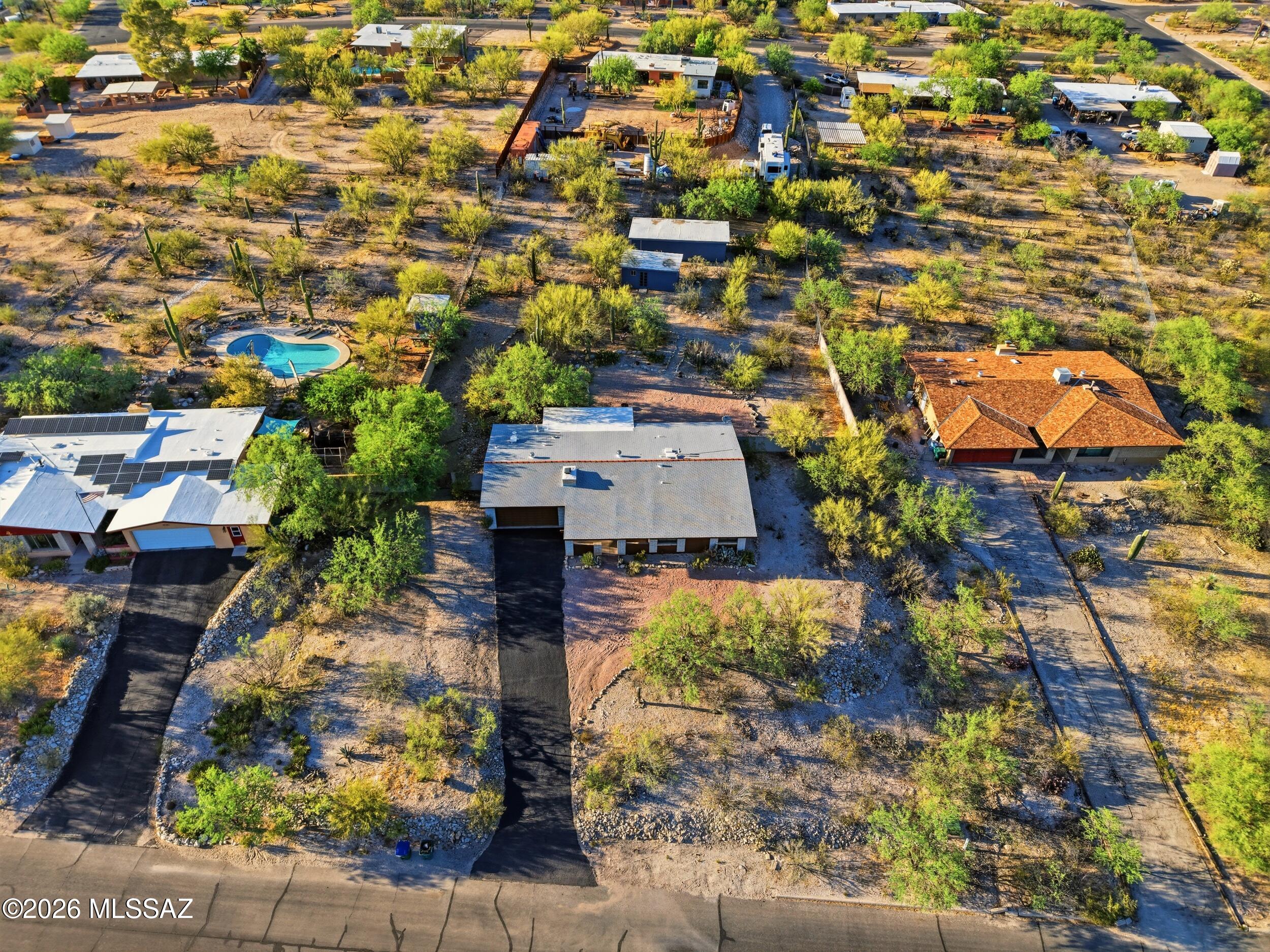 9141 East Indian Canyon Road Tucson, AZ 85749 - Photo 31 of 33 an aerial view of residential houses with outdoor space