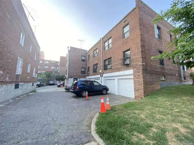 a view of a street with cars