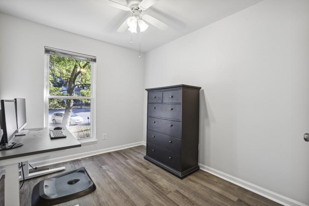 10145 Rillridge Court Alpharetta, GA 30022 - Photo 14 of 26 a view of a hallway with wooden floor and closet