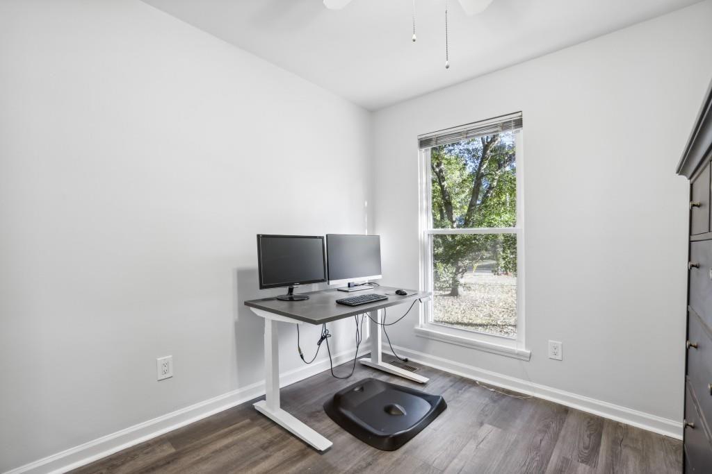 10145 Rillridge Court Alpharetta, GA 30022 - Photo 15 of 26 a view of a workspace with furniture and a window