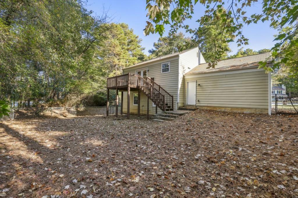 10145 Rillridge Court Alpharetta, GA 30022 - Photo 26 of 26 a view of a house with a backyard