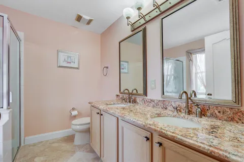 a view of room with window and ceiling fan