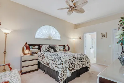 a bathroom with a tub shower and sink