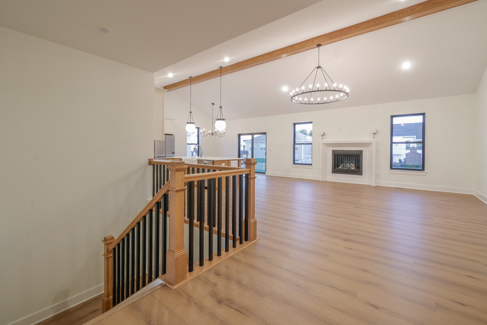 1823 Constitution Street Sycamore, IL 60178 - Photo 16 of 26 a view of a hallway with wooden floor and staircase