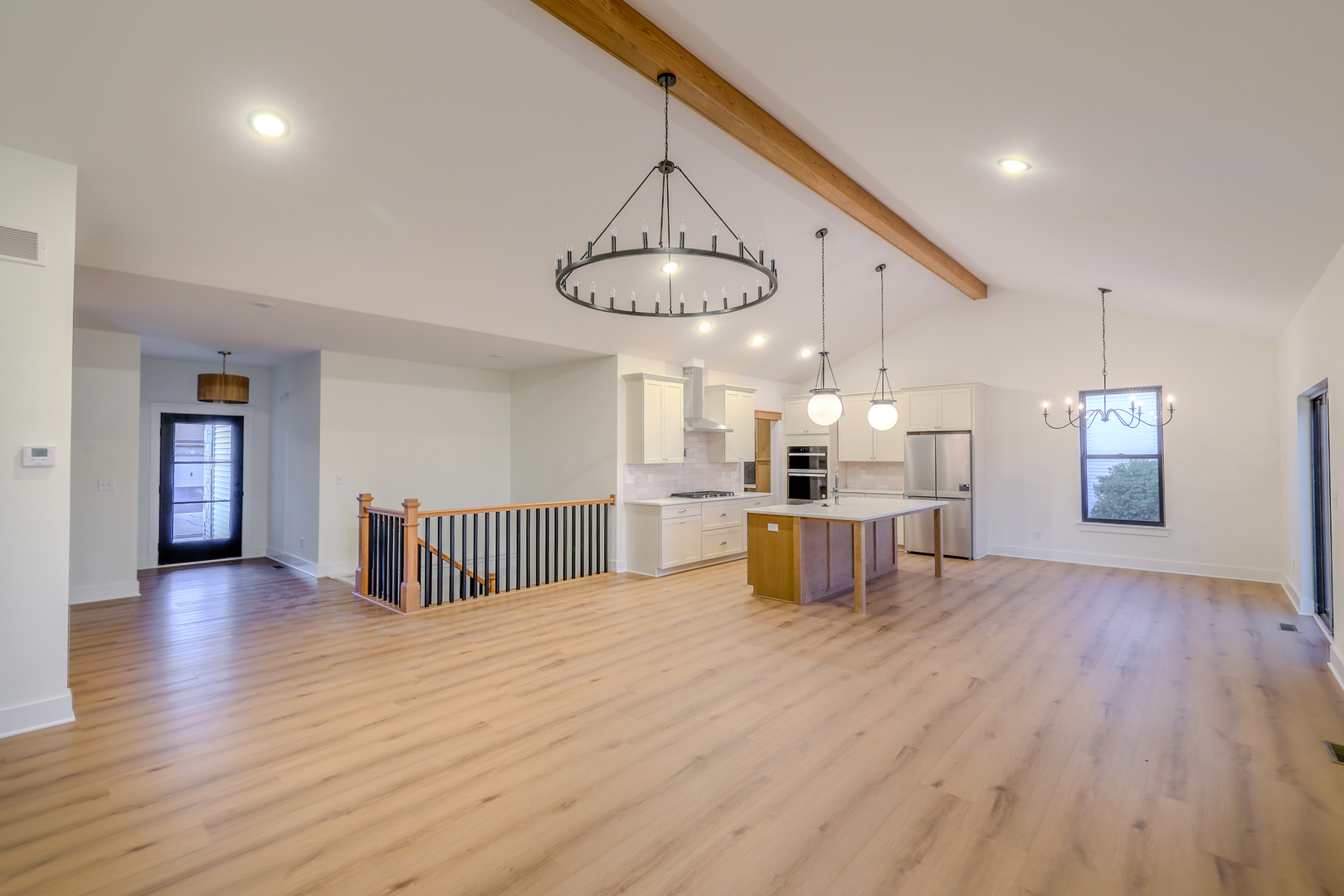 1823 Constitution Street Sycamore, IL 60178 - Photo 4 of 26 a kitchen with stainless steel appliances kitchen island a large island in the center