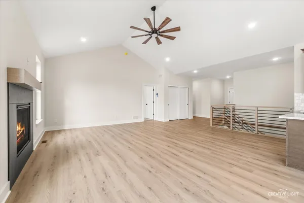 a view of a hallway with stairs