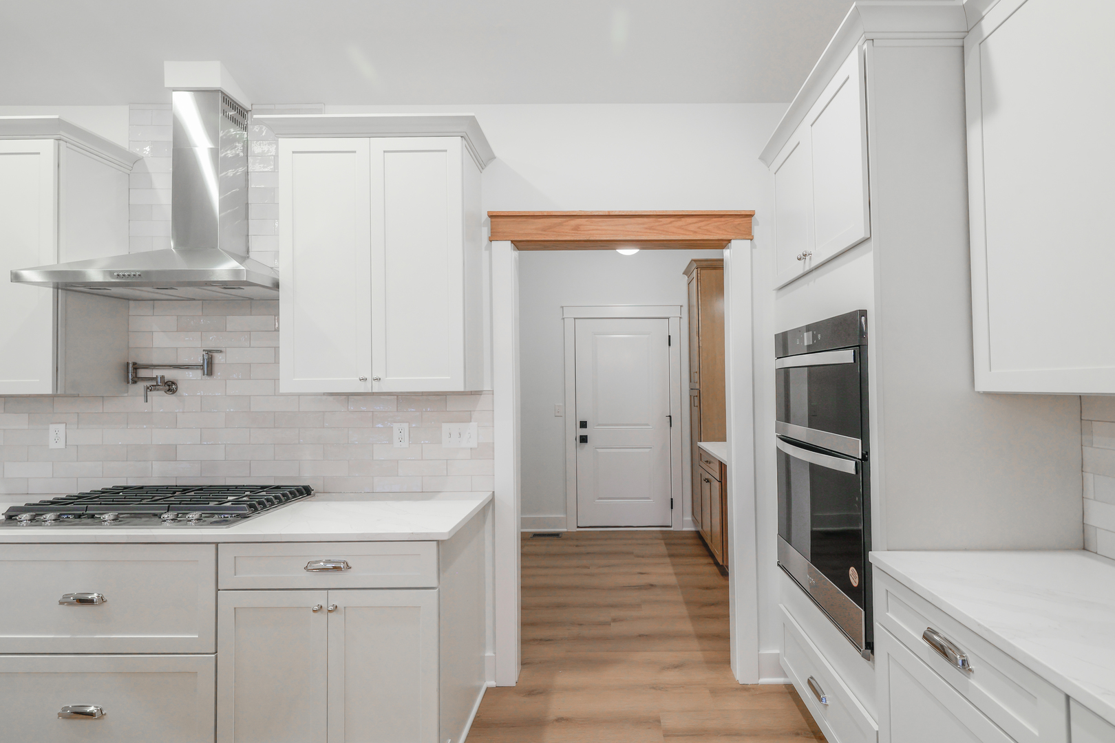 1823 Constitution Street Sycamore, IL 60178 - Photo 9 of 26 a kitchen with stainless steel appliances granite countertop a stove and a refrigerator