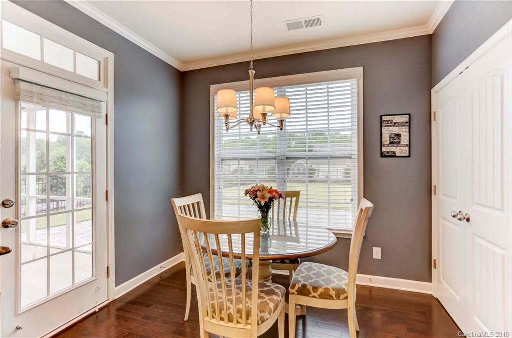 516 Rosemary Lane Fort Mill, SC 29708 - Photo 11 of 36 a dining room with furniture and window