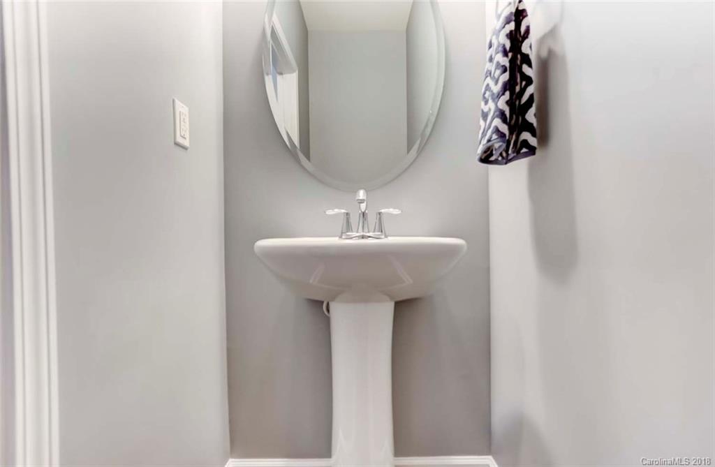 516 Rosemary Lane Fort Mill, SC 29708 - Photo 20 of 36 a bathroom with a sink and mirror