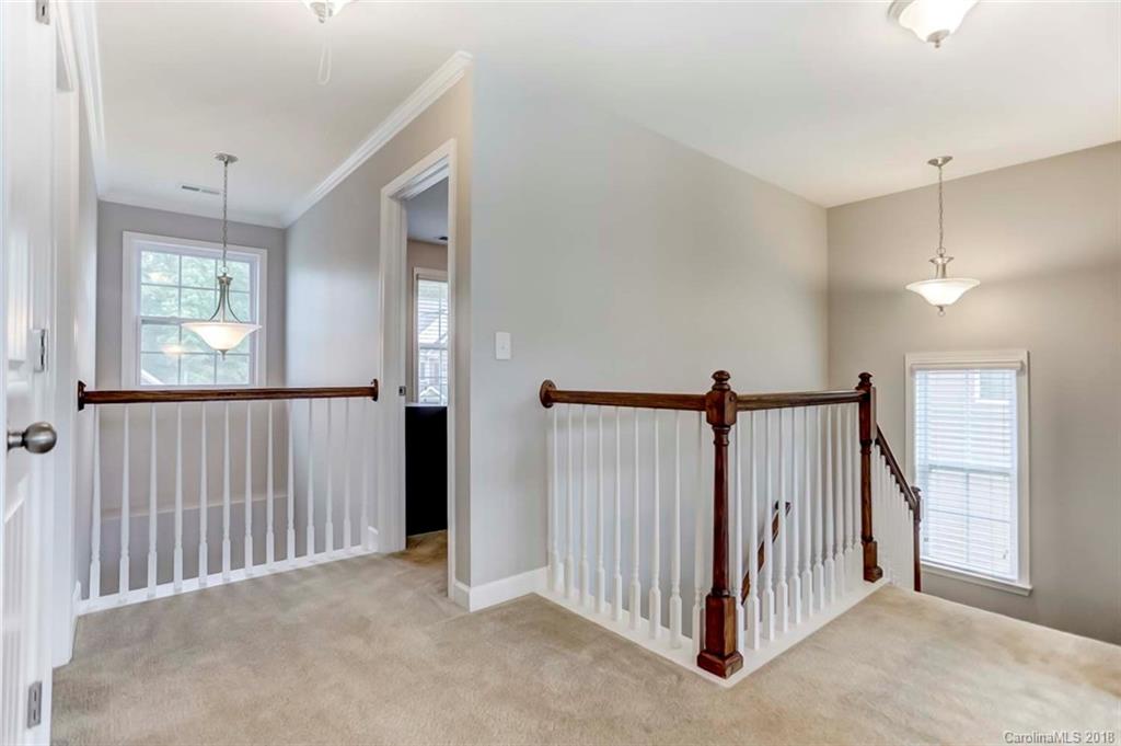 516 Rosemary Lane Fort Mill, SC 29708 - Photo 27 of 36 a view of a hallway with a porch